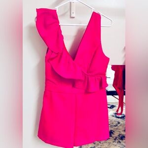 Pink Romper by Do + Be. Size Large but runs small. Super cute for summer.